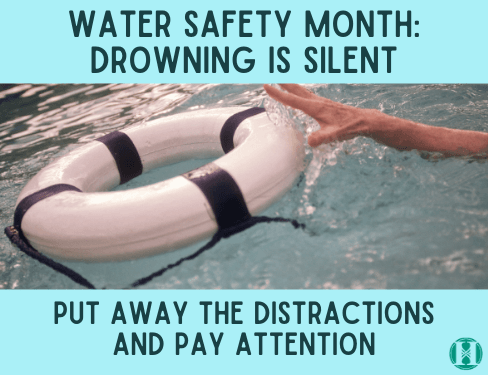 Water Safety Month Hand reaching for life preserver 